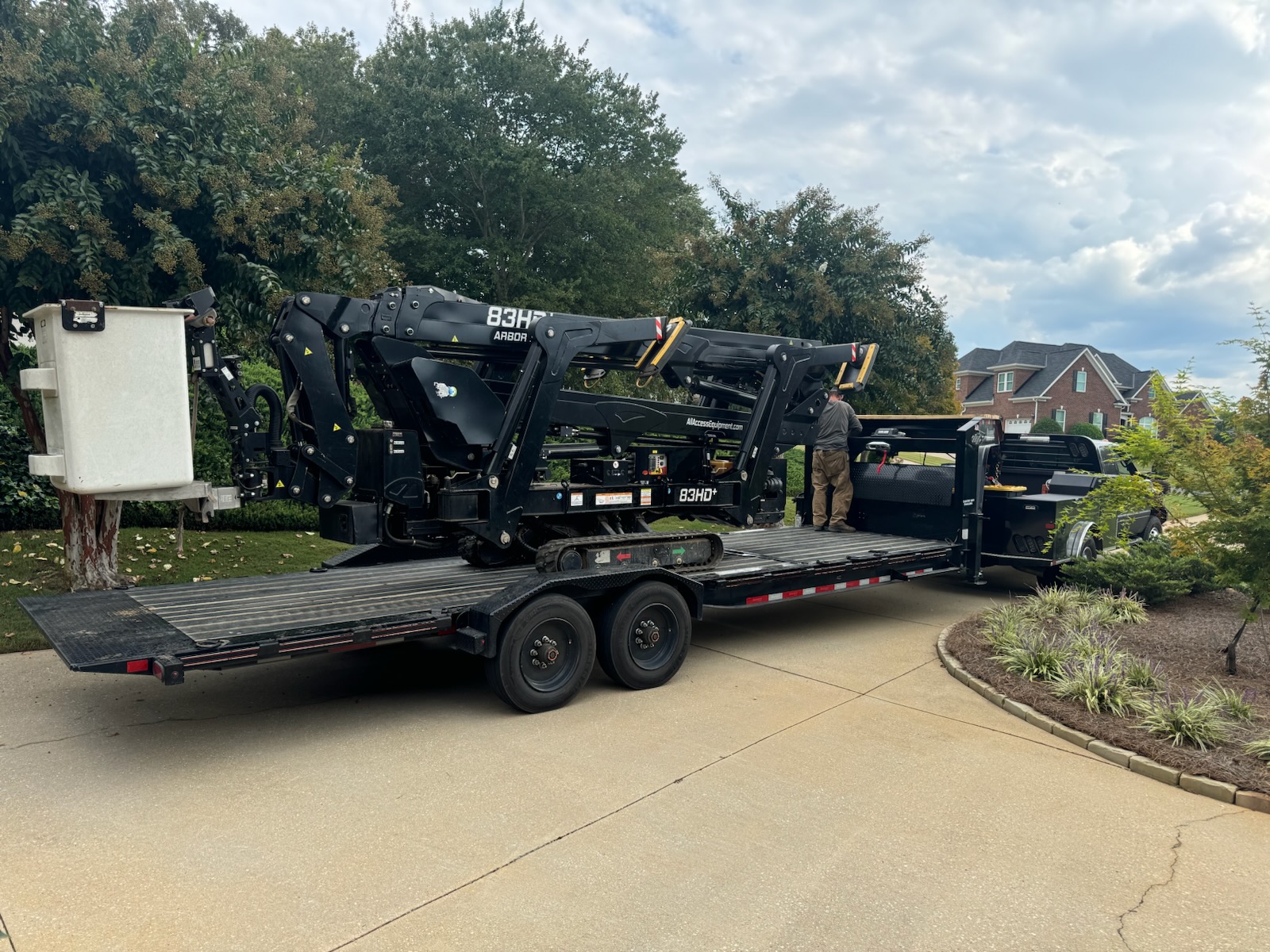 Our Custom Lift. It can enter a 36 Inch access, and is equipped with rubber treads to minimize disturbance and allow access to tight areas.